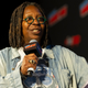 Whoopi Goldberg on stage at NYCC
